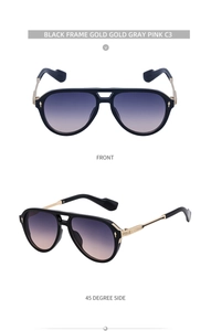 Detail view of aviator sunglasses with black frame, gold temples and gradient lenses