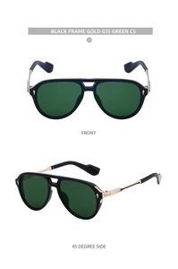 Detail view of aviator sunglasses with black frame gold metal temples and G15 green lens