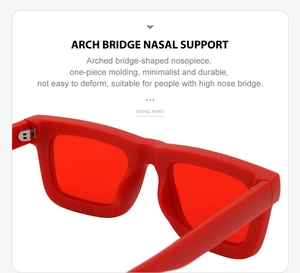 Détail de lunettes de soleil rouges avec pont en forme d'arche pour la durabilité