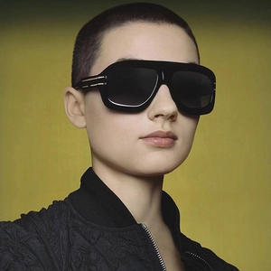 Chic oversized square sunglasses with thick black frames and gold metal accents on temples
