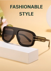 Detail of square black sunglasses with elegant gold stripe accents on the temples