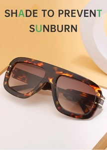Detailed macro view of retro tortoiseshell square frames with brown gradient lenses