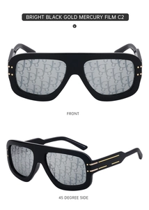 Detail of square black frame sunglasses with silver mercury lenses and gold metal accents