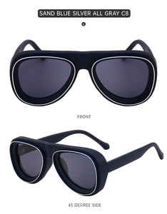 Détail des lunettes aviateur bleu sable avec bordure argent et verres gris