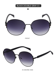 Close-up of black round sunglasses with classic green and red stripe detail on the hinges