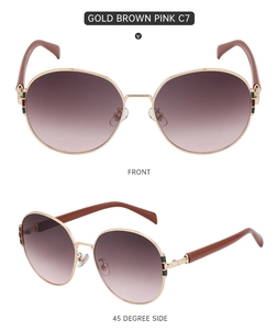 Front and 45-degree views of gold metal round sunglasses with pink gradient lenses