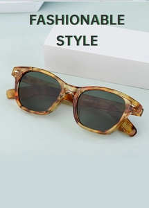 Detail of tortoiseshell frame sunglasses showing ZS98153 model number and 54-16 sizing