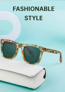 Detail showing tortoiseshell cat-eye sunglasses with green lenses and premium leather case