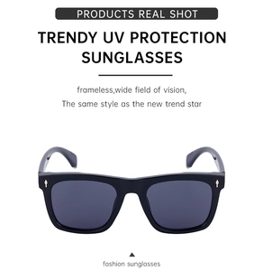 Detail of polarized cat-eye sunglasses with gold diamond rivets and UV protection