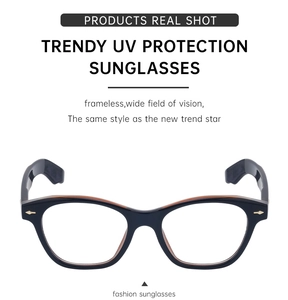 Detail of vintage cat-eye glasses frame featuring golden diamond metal hinge accents