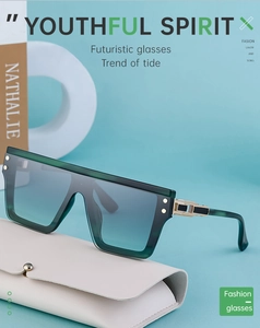 Detailed view of oversized marble texture sunglasses with golden temple accents and case