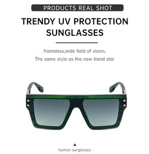 Detail of dark green marble pattern frames with gold rivets on square sunglasses