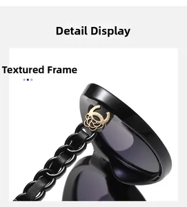 Macro view of luxury polarized sunglasses with gold floral metal hinge and chain detail