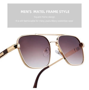 Detailansicht der quadratischen Gold-Metall-Sonnenbrille mit braunen Gläsern und Doppelsteg