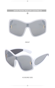 Detail view of white frame sunglasses with silver mercury coating and gold accents