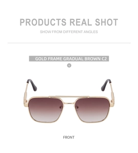 Detail einer Vintage-Pilotenbrille aus Goldmetall mit braunem Farbverlauf und Doppelsteg
