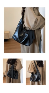 Détails du grand sac hobo minimaliste noir avec boucle métallique réglable sur la bandoulière
