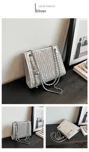 Silver quilted shoulder bag with chain strap shown in front and side detail views