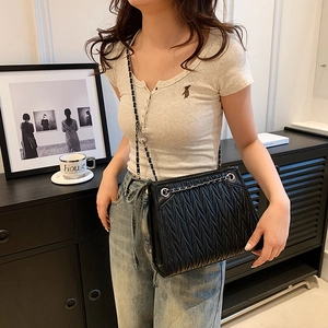 Chic black quilted chain crossbody bag for women with stylish silver-tone hardware accents