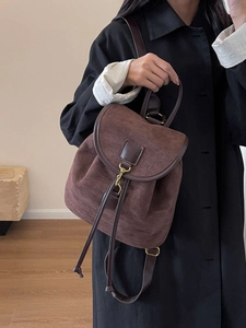 Retro dark brown suede backpack with drawstring closure and golden metal turn-lock buckle