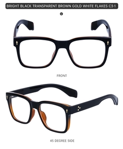 Detail view of square frame glasses in bright black and transparent brown with star rivets