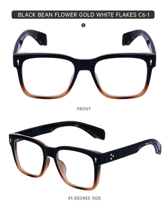 Close-up of retro square black frames with tortoise shell texture and gold rivets