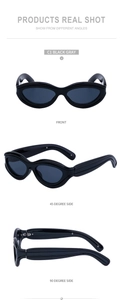 Dettagli di occhiali da sole cat-eye neri con lenti grigie e logo laterale elegante