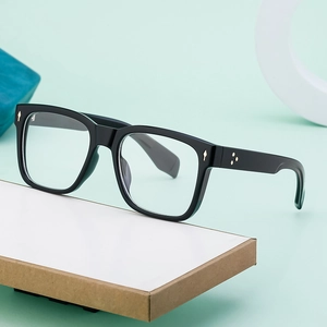 Retro square black thick frame glasses with gold rivet accents and star details on temples