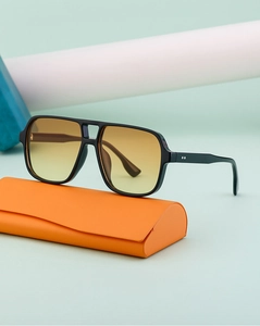 Retro double bridge aviator sunglasses with yellow gradient lenses and orange case