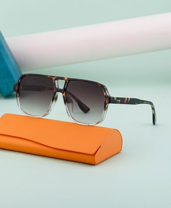 Retro double-bridge aviator sunglasses in tortoiseshell frame with bright orange case