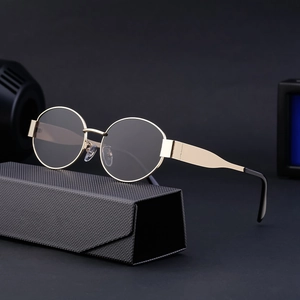 Retro oval metal sunglasses in gold frame with gray lenses and a triangle case