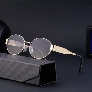 Vintage gold metal round frame sunglasses with grey lenses and black quilted folding case