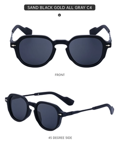 Detail of sand black frame sunglasses with golden arrow rivet and gray lenses