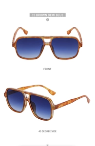 Detail view of aviator sunglasses with brown demi frames and blue gradient lenses