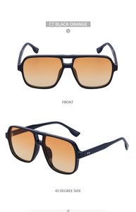 Retro double-bridge sunglasses with black frame, orange gradient lenses and side rivets