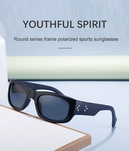 Detail of matte black sports sunglasses with polarized lenses and star temple accents