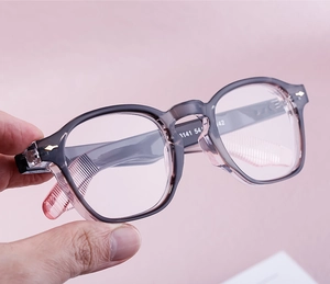 Detailed view of translucent grey-purple round frames with internal temple specifications