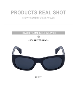 Close-up of polarized sunglasses featuring black frames and gold-grey lenses in C1 color