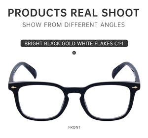 Vue de face de lunettes carrées noir brillant avec détails dorés sur les branches