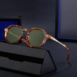 Vintage tortoiseshell square sunglasses with green lenses and metal temples on black case