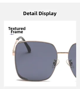 Detailed close-up of premium gold metal hinges and polarized lenses on sunglasses