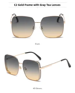 Detail view of large square polarized sunglasses with golden frames and gradient lenses