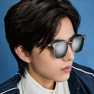 Detail of square polarized sunglasses featuring tortoiseshell temples and semi-rimless frame