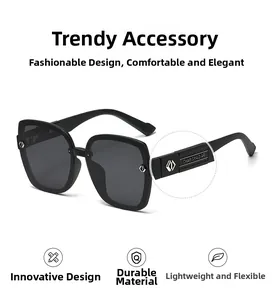 Detail of square oversized polarized sunglasses featuring silver metal logo on the temple