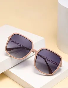 Detail of trendy pink polarized sunglasses with metal chain temple design on display