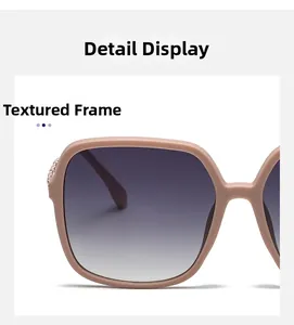Close-up of nude pink matte frames with gold metal accents on polarized sunglasses