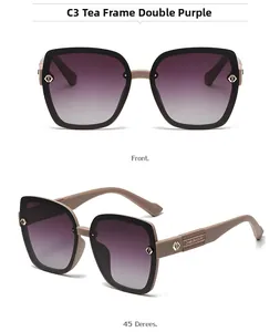 Detail view of large square tea frame sunglasses with purple gradient lenses and logo