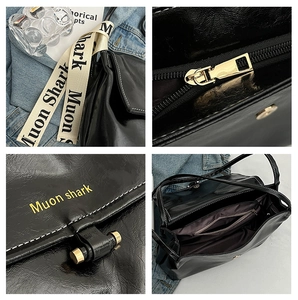 Detailed close-up of glossy black PU leather bag, golden hardware and interior layout