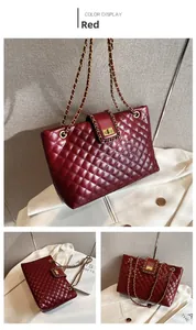 Close-up of red quilted leather tote bag featuring gold chain strap and metal clasp