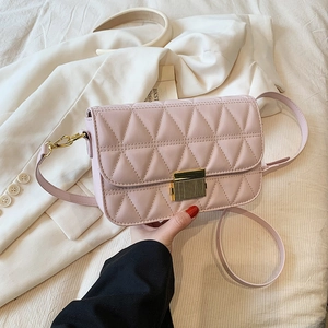 Chic light pink quilted shoulder bag with gold clasp and adjustable strap for women